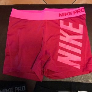 Hot pink nike pro compact shorts